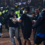 Indonesia stadium crush, fans “died in the arms” of players