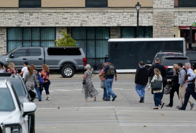 Man charged with murder in hotel shooting in Michigan