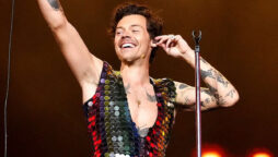Harry Styles laughs off ‘unfortunate’ bottle hit at Chicago gig