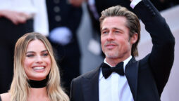 Margot Robbie and Brad Pitt