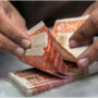 Rupee records marginal gains