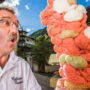 World record: man balances 125 ice cream scoops on 1 cone