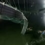 After an Indian bridge collapses, hundreds plunge into rivers