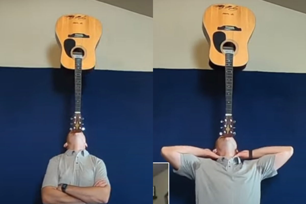 balances guitar on chin