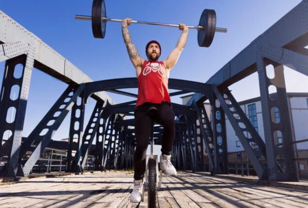 Scottish man breaks world record for barbell unicycling