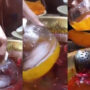 Man uses block of ice to remove extra fat from food