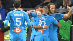 Marseille climb to top of Ligue 1 after opening victory over Angers by 3-0
