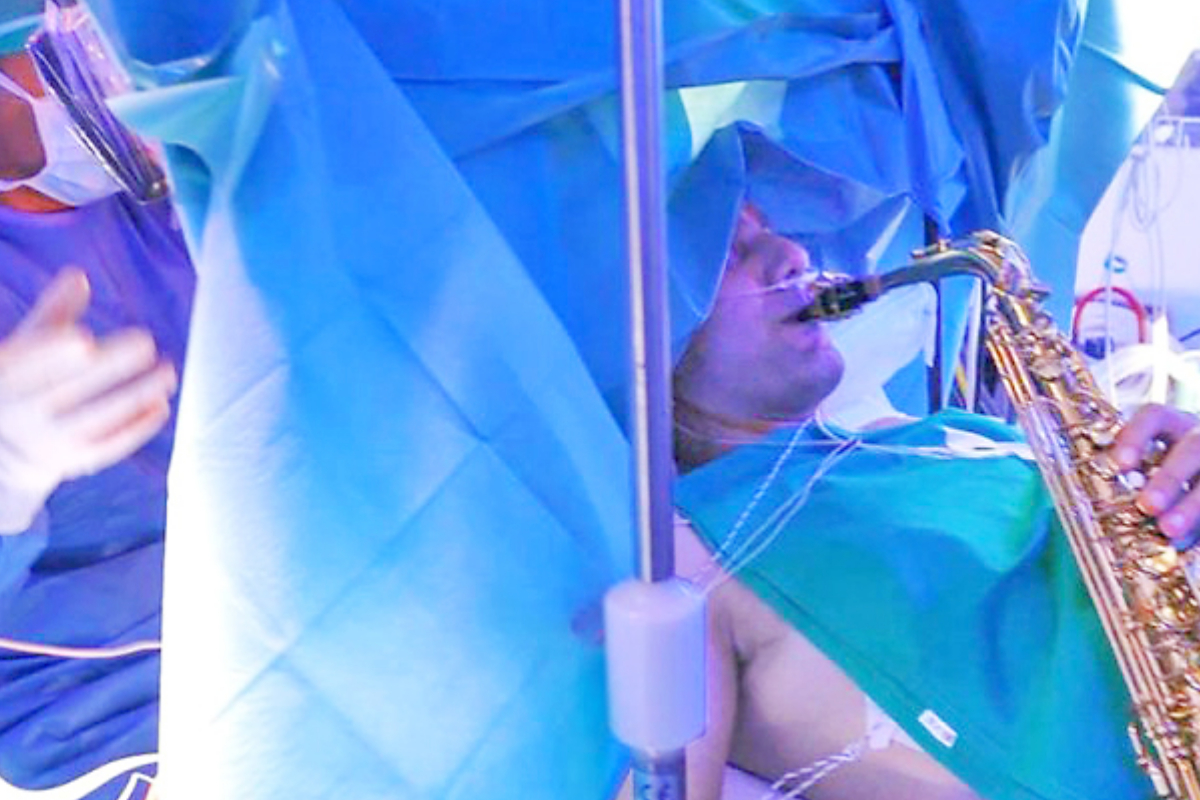 Patient plays saxophone