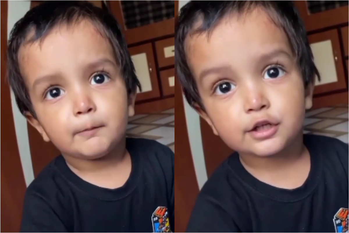 Little boy talking about spelling