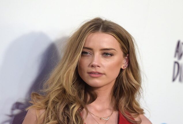 Amber Heard makes headlines for taking a trip to Spain