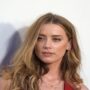 Amber Heard makes headlines for taking a trip to Spain