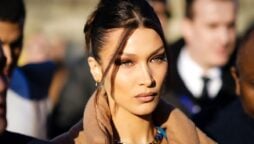 Bella Hadid closed the show during Paris Fashion Week in an iconic spray-on dress