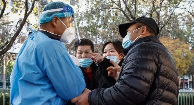 China Covid: Record cases as the virus spreads widely