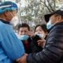 China Covid: Record cases as the virus spreads widely