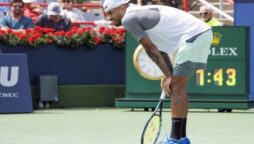 Australian tennis player settles lawsuit with Wimbledon fan