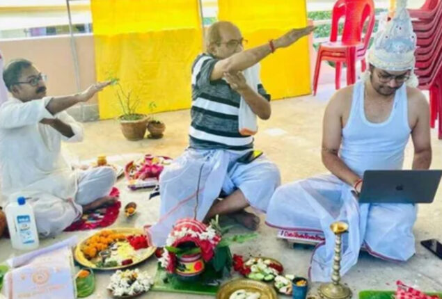 A groom from Kolkata worked on laptop during wedding ceremony