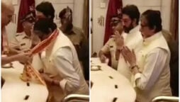 Amitabh and Abhishek twin in white at Siddhivinayak temple