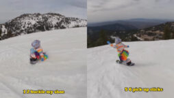 ‘One, Two, Buckle My Shoe!’ Little girl singing while snowboarding