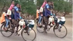 Man Riding a Bicycle with Nine Children: Viral Video
