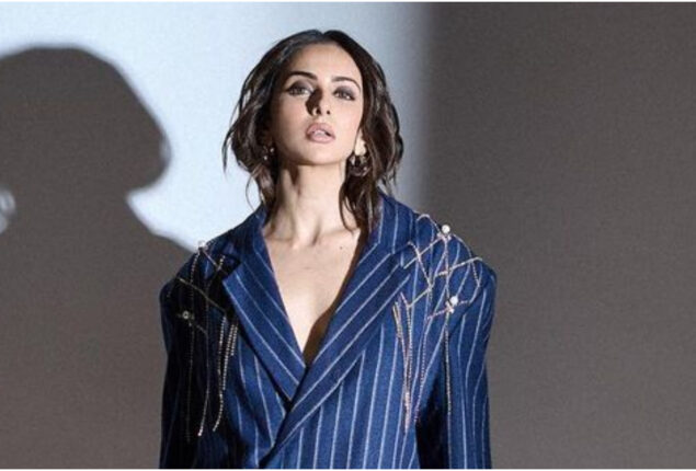 Rakul Preet Singh does power dressing in a striped coat & trousers