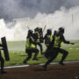 Report blames Indonesian police tear gas for tragic football match crush