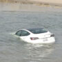 Tesla model 3 floats in ocean, owner unaware