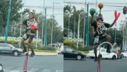Watch: Man Rides One-Wheel Cycle at Red Light