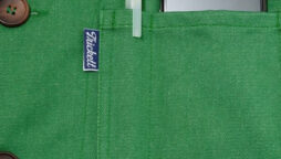 Brand marketing £115 green denim jacket with sausage roll pocket