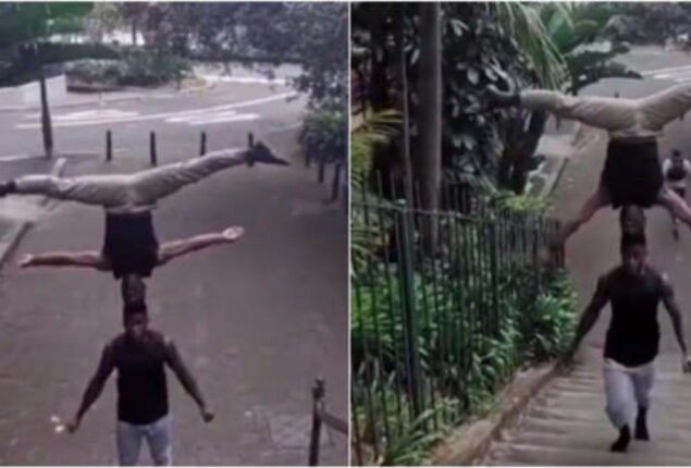 Viral Video: Man climbs stairs holding another man’s head