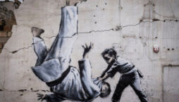 Ukrainian building gets Banksy mural after being shelled