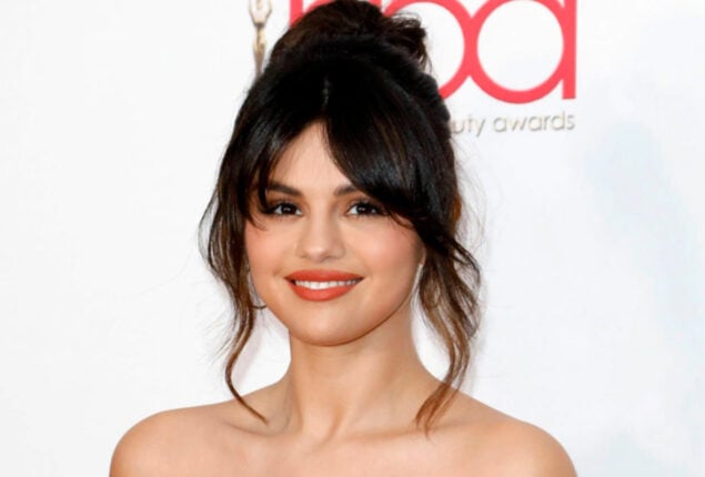 Selena Gomez accepts an award for mental health awareness
