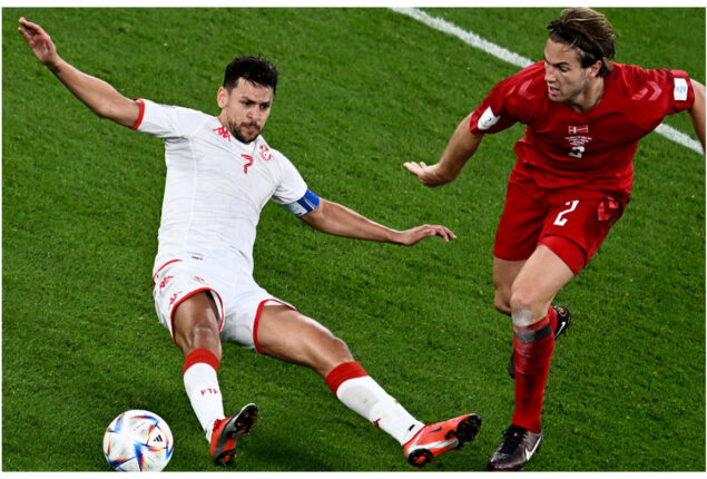 Tunisia holds Denmark in World Cup opener