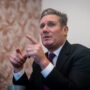 Keir Starmer warns corporations to reduce immigration