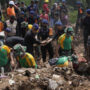 Indonesian rescuers battles aftershocks during survivor search