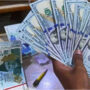 Rupee slips against dollar on IMF programme delay fears