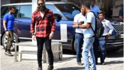 Yash poses with his dreadlocks and beard at Mumbai airport