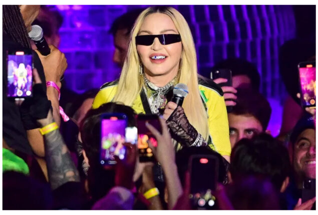 Madonna Celebrates the 30-Year Anniversary of Her Book by Flaunting Curves in  Skintight Corset