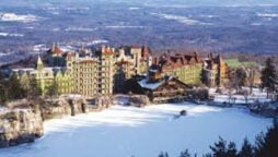 As a winter snowstorm lashes Upstate New York, two people die while shoveling heavy snow.