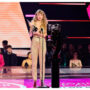 Taylor Swift Makes Surprise AMAs Appearance in Golden Jumpsuit