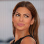 Eva Mendes posed with her arm up to show a tattoo dedicated to partner Ryan Gosling