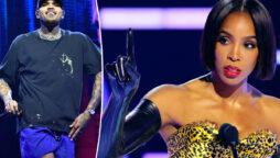 Kelly Rowland calms the AMAs crowd after Chris Brown’s victory