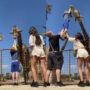 Watch: Giraffe lifts a boy in air as he feeds the herbivore