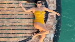 Priyanka Chopra in yellow swimsuit as she lounges on yacht