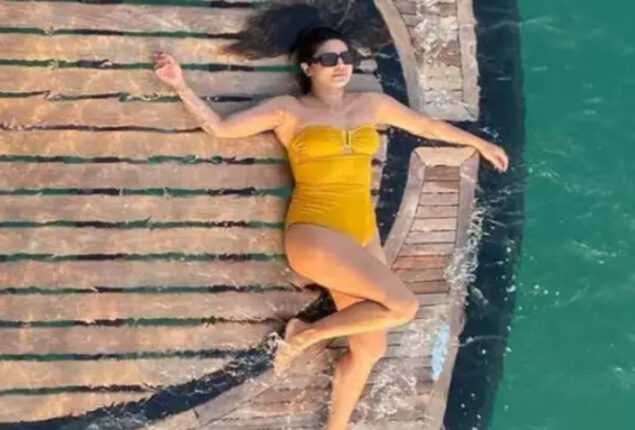 Priyanka Chopra in yellow swimsuit as she lounges on yacht