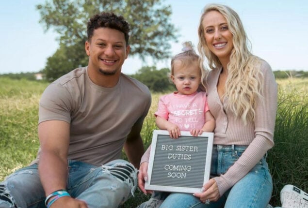 Sterling and Bronze  cuddled while supporting their dad Patrick  on NFL Sunday