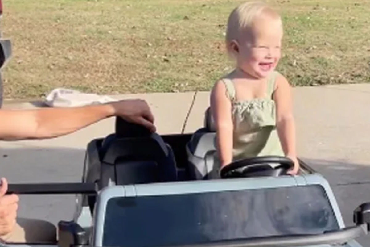 Daughter reaction to receiving a minicar gift