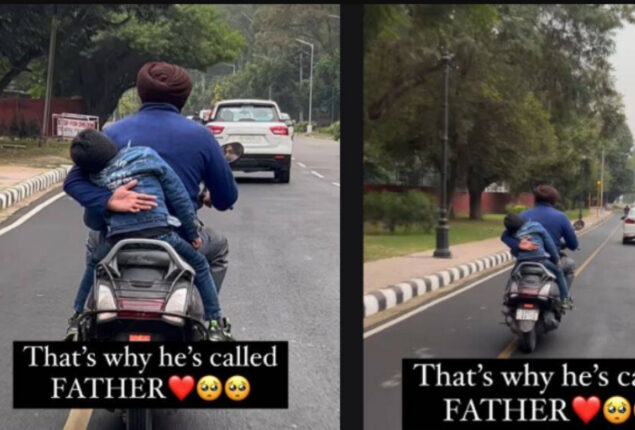 Father stops his son from falling off a moving scooter