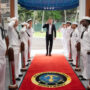 Prince Harry Salutes Navy Servicemen at Pearl Harbor Photos