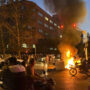 Iran hangs its first mass protester
