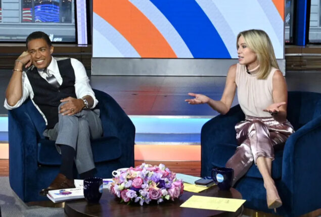 T.J. Holmes and Amy Robach leave their date holding hands